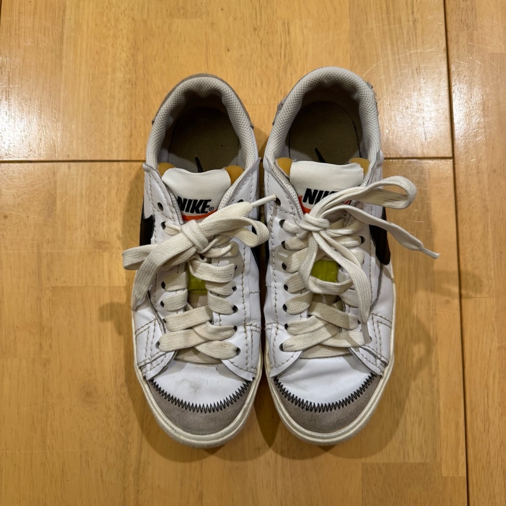 Nike White and Gray Sneakers with Black Swoosh